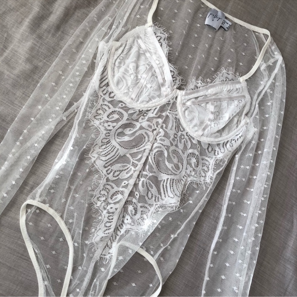 Sheer white lace floral bodysuit